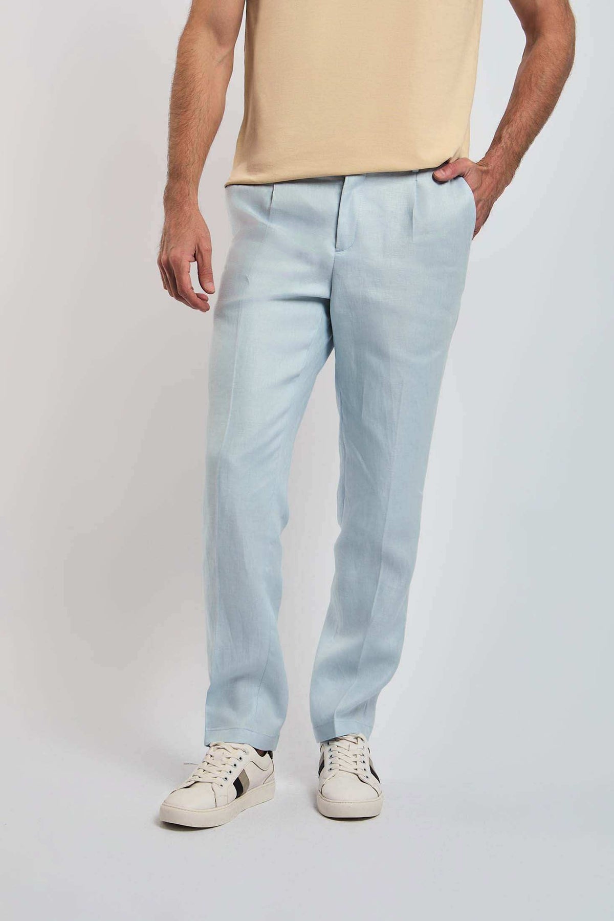 Dalydress men's light blue pants paired with beige shirt and white sneakers