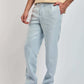Dalydress men's light blue trousers styled with a beige top and white sneakers