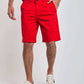 Men's casual red printed shorts by Dalydress, styled with white sneakers