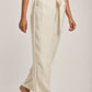 Dalydress women's cream striped wide-leg pants with a tie waist, styled with beige sandals