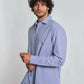 Man wearing Dalydress blue and white striped shirt and jeans, casual menswear fashion