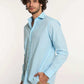 Dalydress men’s casual light blue button-up shirt with beige pants, white background