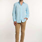 Man in light blue button-down shirt, beige pants, and brown shoes from Dalydress menswear collection