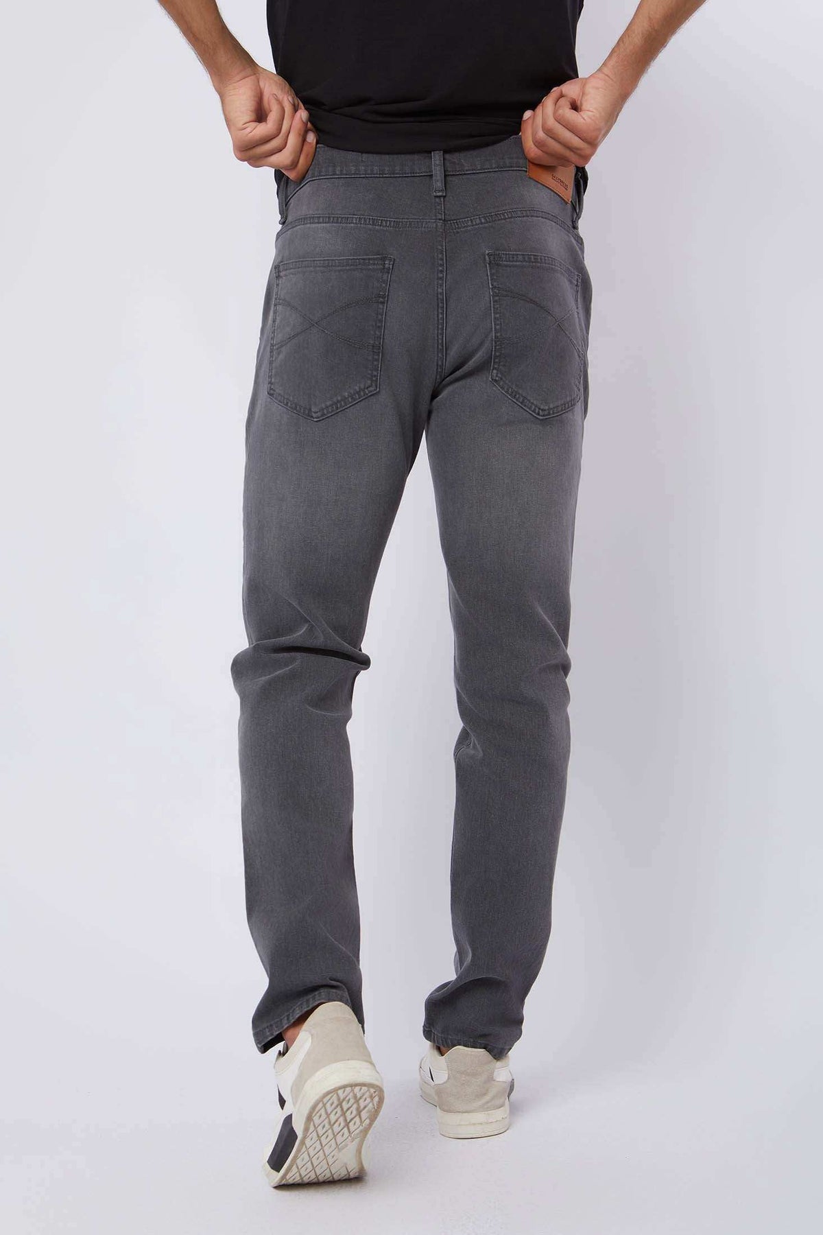 Dalydress men’s grey straight-fit jeans back view, casual wear, white sneakers