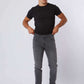 Dalydress men’s casual outfit with black graphic t-shirt and gray jeans, white sneakers