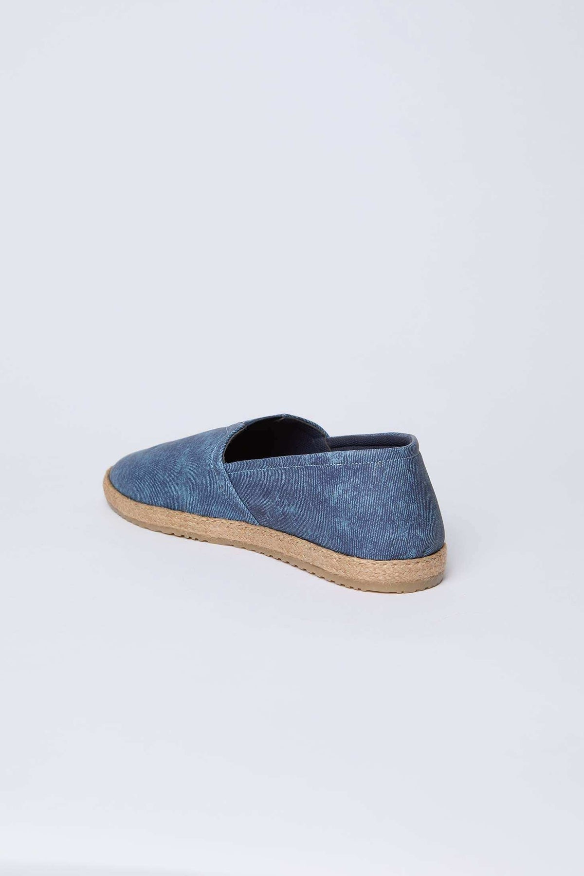 Dalydress blue denim espadrille shoe with woven sole on white background